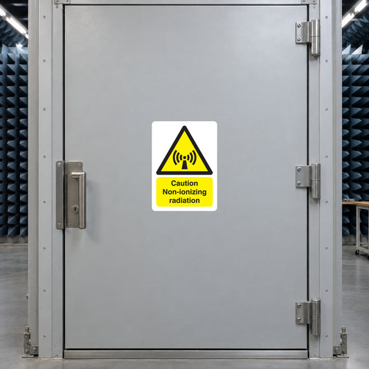 Caution non-ionizing radiation warning sticker with yellow triangle and black text
