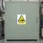 Corrosive caution sticker with yellow warning triangle and "Corrosive" label