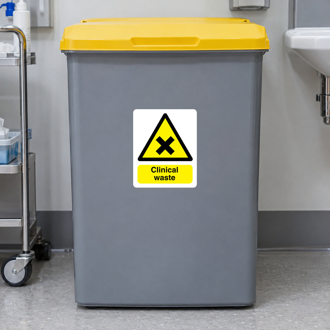 Clinical Waste sticker on a closed healthcare waste collection bin