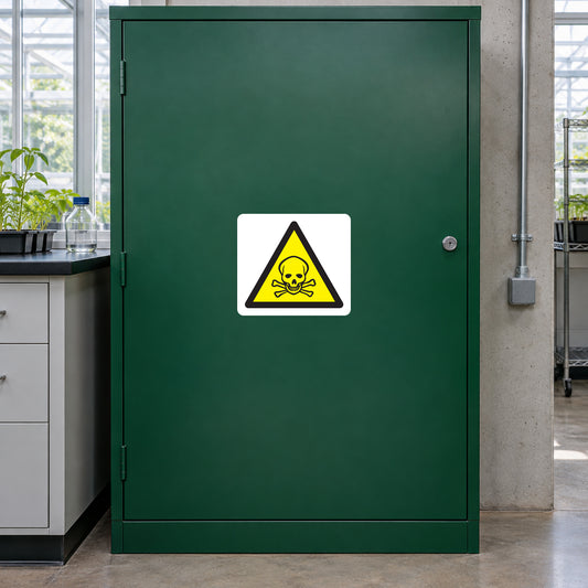 Poison caution warning sticker with yellow biohazard symbol on door