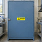 Danger sodium hydrosulphide warning sticker, yellow with black text and border
