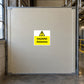 Asbestos hazard sticker with yellow warning triangle and 'HAZARD Asbestos' text