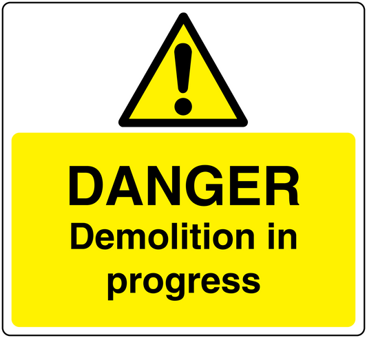 Yellow warning sticker with black danger triangle and “Danger Demolition in progress”