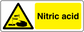 Warning sticker with hazard triangle and yellow panel reading "Nitric acid"