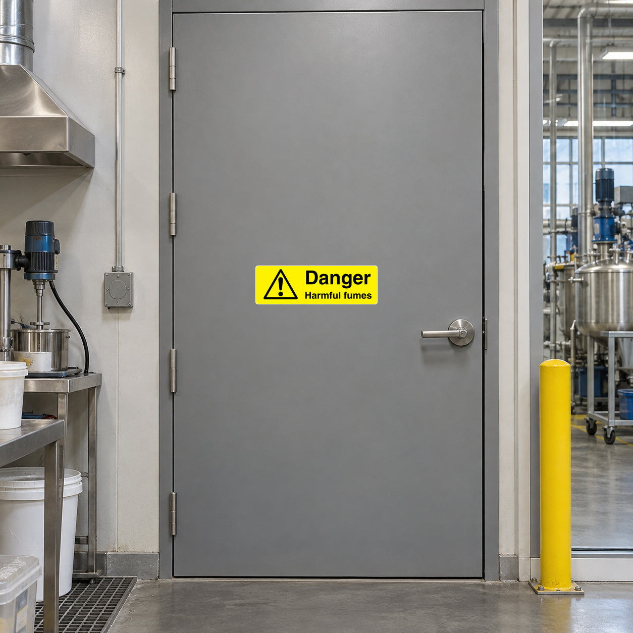Yellow warning sticker with red exclamation and Danger Harmful fumes text