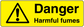 Yellow warning sticker with black hazard triangle and text “Danger” and “Harmful fumes”