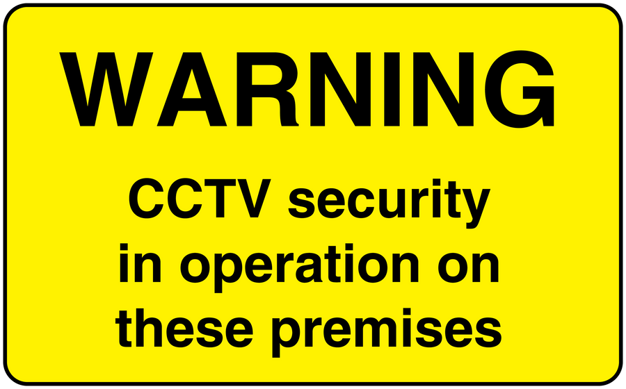 Yellow CCTV warning sticker with black text: WARNING CCTV security in operation on these premises