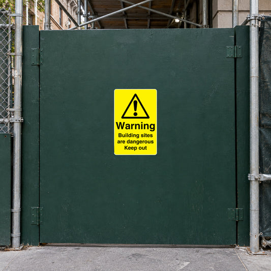 Yellow warning construction site sticker with caution triangle and Keep out text