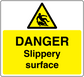 Yellow danger slippery surface sticker with warning triangle and bold text
