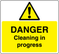 Yellow warning sticker with black hazard triangle and 'DANGER Cleaning in progress'