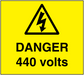 Yellow warning sticker with black triangle lightning and text 'DANGER 440 volts'.