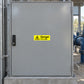 Safety warning sticker with 'Danger 415 volts' text on yellow label