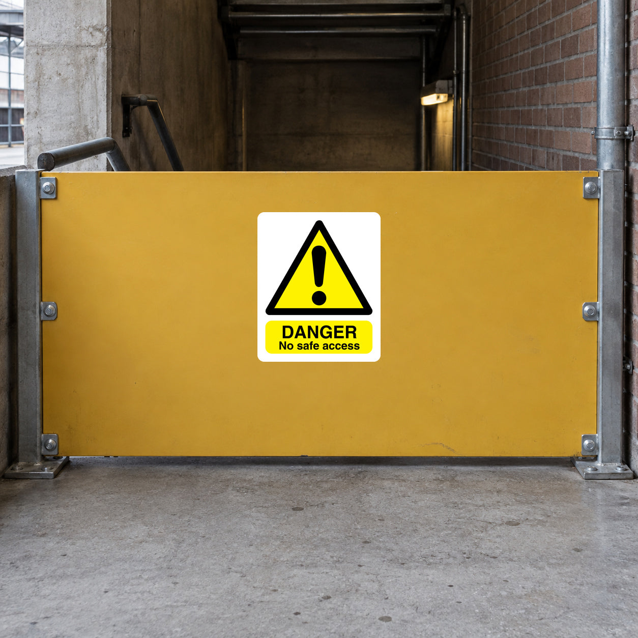 Yellow danger warning sticker with exclamation triangle and text “DANGER No safe access”