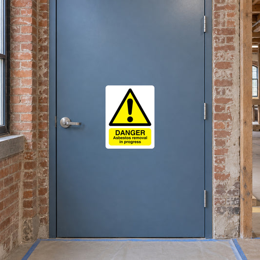 Asbestos removal danger warning sticker with yellow triangle and 'In progress' text
