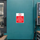 Square warning sticker with red text: "Do not distract the operator while the machine is moving"