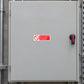 Red warning sticker: 'Do not switch on. Men working on machine'