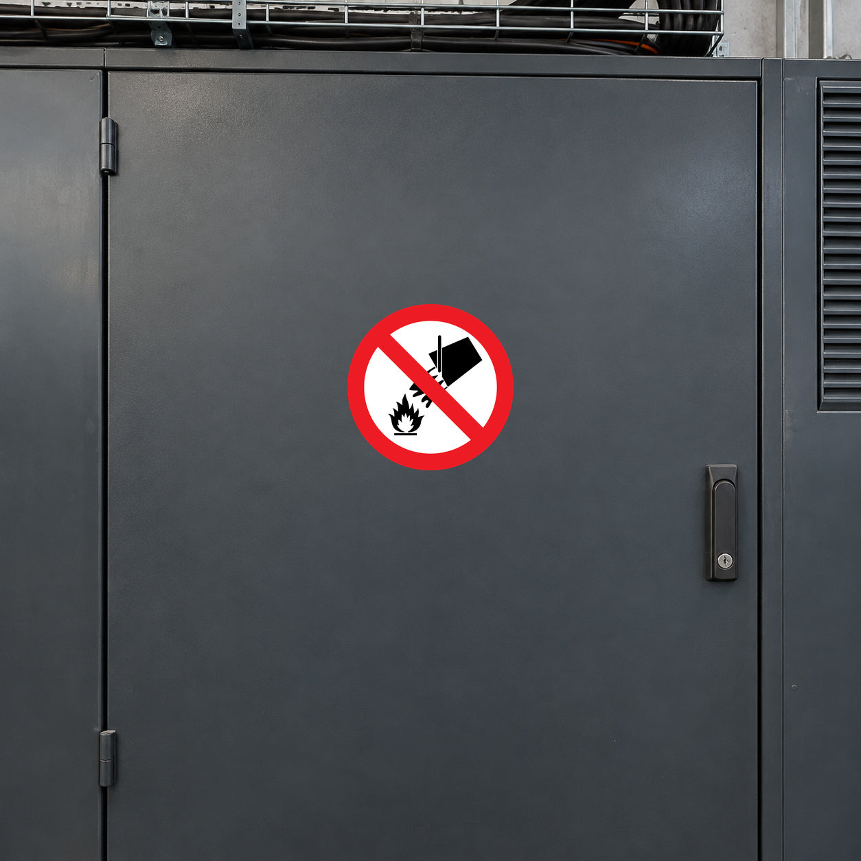 Safety sticker with red prohibition sign over fire and water icon