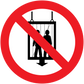 Red prohibition sticker with slash over a person silhouette behind railings