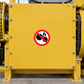 Red no-hand safety warning sticker on yellow industrial panel