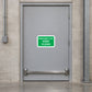 Emergency exit keep clear sticker with green border and white text on door