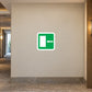 Green door sticker with left arrow and door opening icon