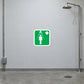 Green first aid warning sticker with white person and plus symbol icon