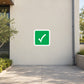 Check Mark Sticker applied in workplace emergency assembly courtyard, smooth cream exterior wall, open paved gathering area and planting edge