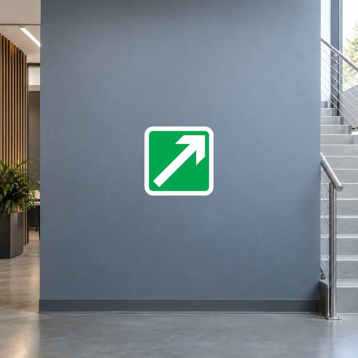 Green square sticker with white arrow pointing up and to the right