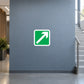 Green square sticker with white arrow pointing up and to the right