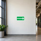 Green right-arrow direction sticker with white border and directional line
