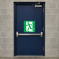 Exit door sticker with green running figure and arrow safety sign