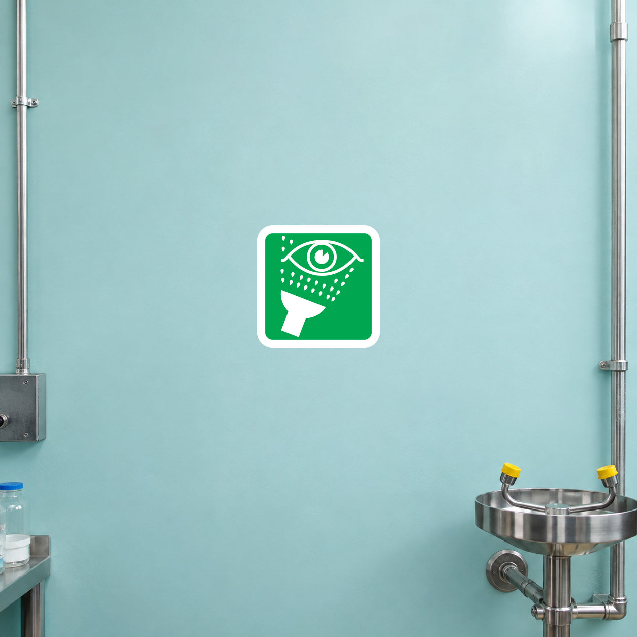 Eye rinse station sticker with green eye icon and white border