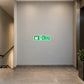 Green fire exit down arrow sticker with running figure and "FIRE EXIT" text