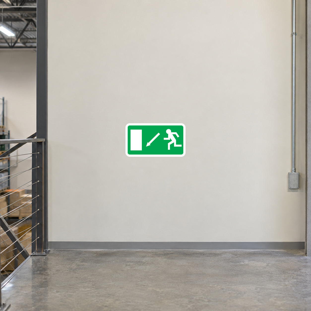 Emergency exit down arrow sticker sign, green and white with running figure icon