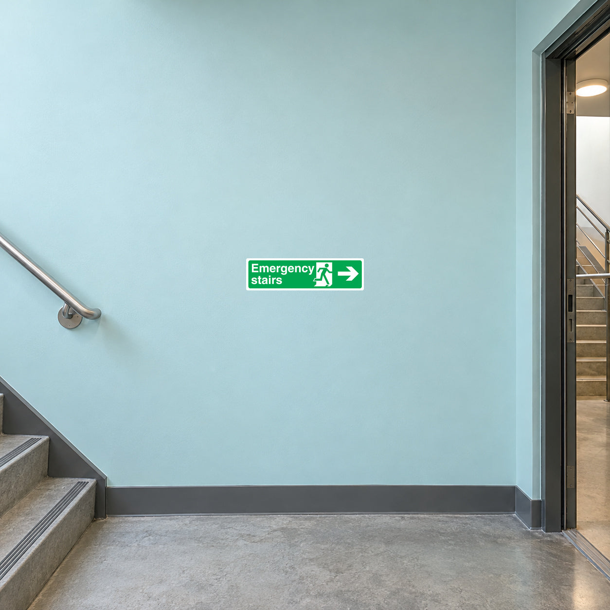 Emergency stairs right arrow sticker, green sign with white text and arrow