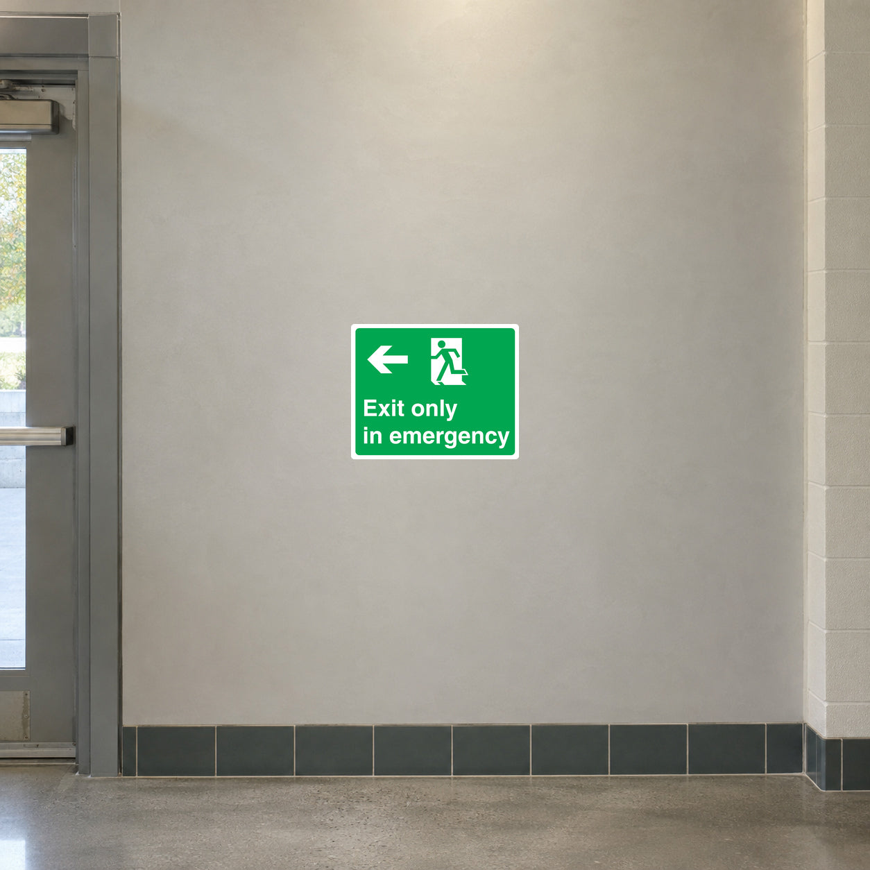 Green emergency exit sign sticker with left arrow and running figure