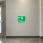 Green emergency exit sign sticker with left arrow and running figure