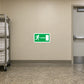Green emergency door exit sticker with running-person icon and arrow toward door