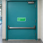 Green emergency exit rectangle sticker with white text