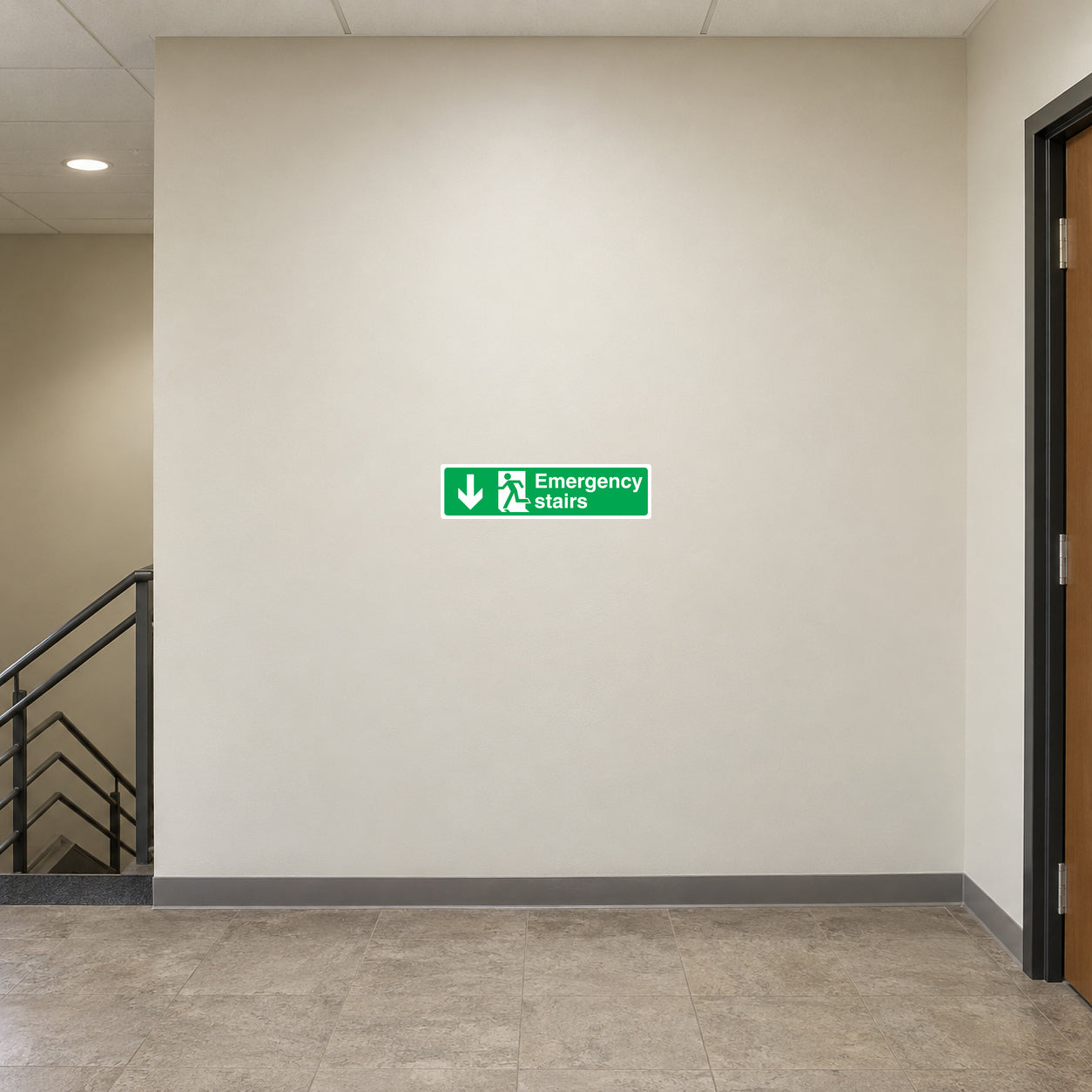 Emergency stairs down sticker, green sign with white arrow and text
