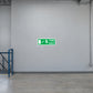 Green fire exit sticker with illuminated-style EXIT text and running figure icon