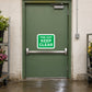 Green fire exit keep clear sticker with bold “FIRE EXIT KEEP CLEAR” text