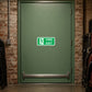 Rectangular green fire exit sticker with white runner and text FIRE EXIT