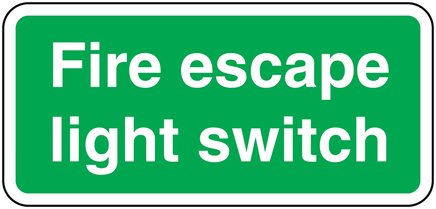 Green light switch sticker with white text “Fire escape light switch”
