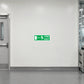 Green Fire Exit sticker with left arrow and running figure pictogram