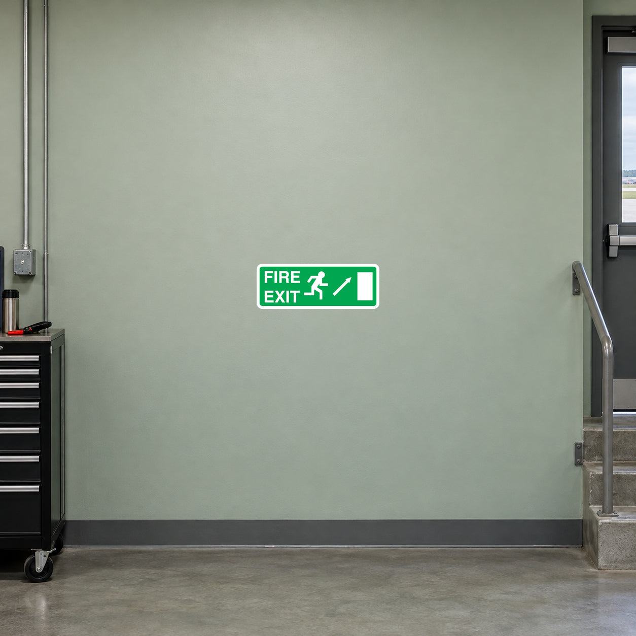 Fire exit sticker with green border, FIRE EXIT text, running icon and right arrow