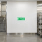 Fire exit here sticker with green border and white pictogram, includes “FIRE EXIT” text