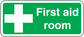 Green first aid room sticker with white cross and 'First aid room' text