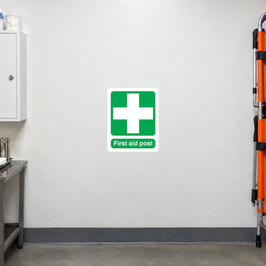 First aid post sticker with green medical cross icon and label text