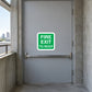 Fire exit to roof sticker with green border and white text reading “FIRE EXIT TO ROOF”